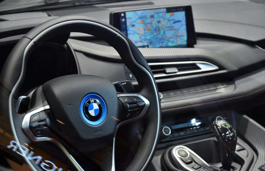 shallow focus photo of black BMW steering wheel